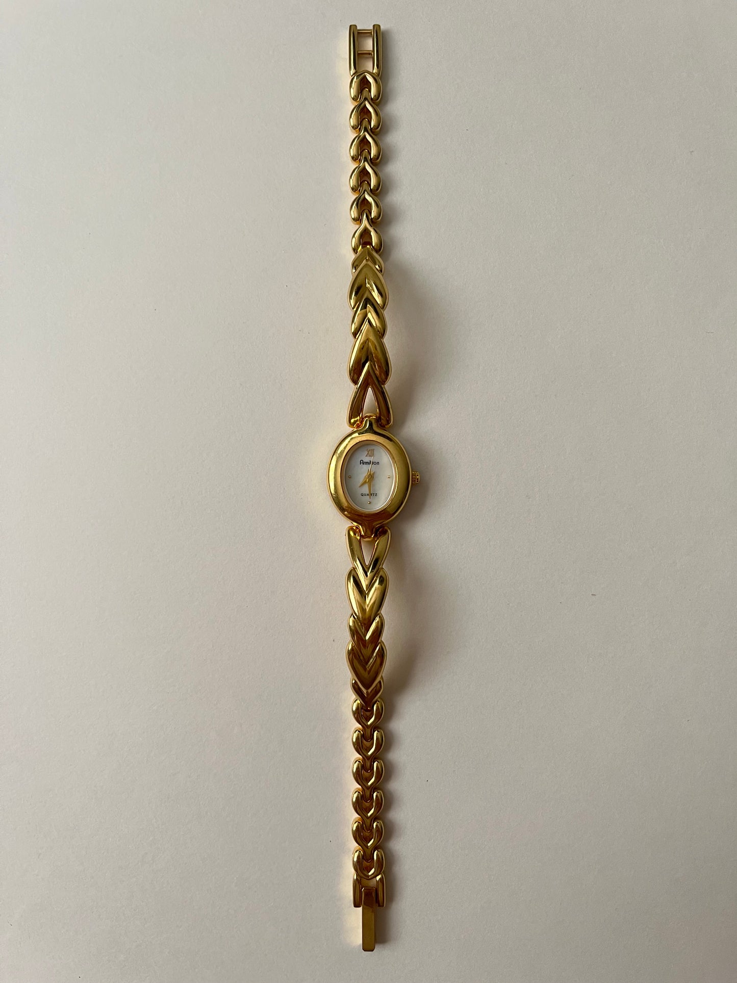 Absolutely Stunning Gold Tone Half Cuff Watch with Oval Dial