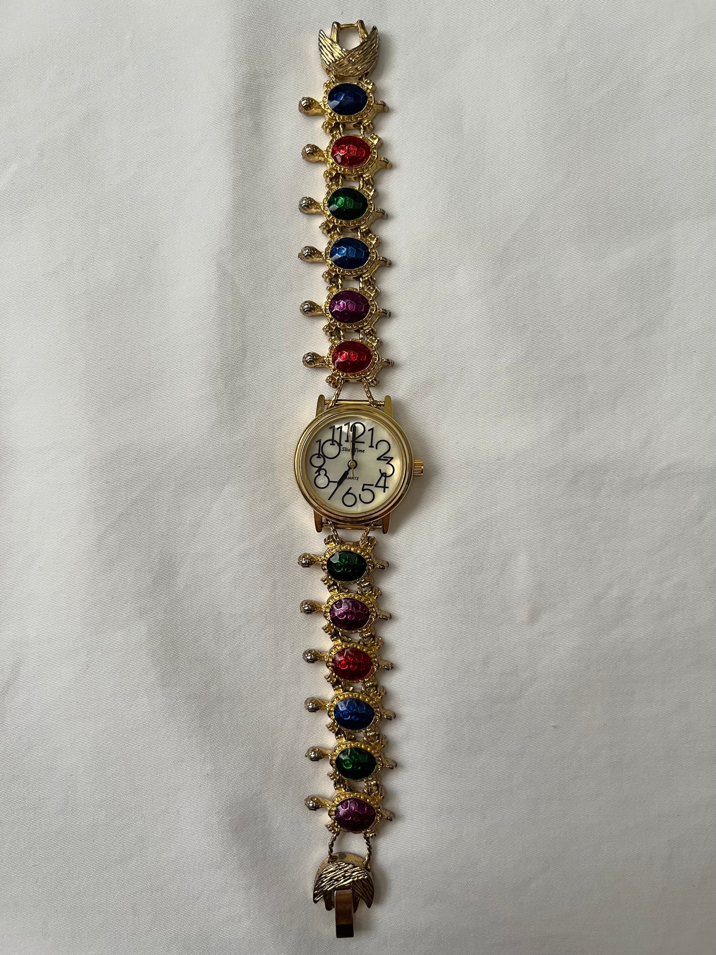 Adorable Gold Tone Slider Watch with Turtle Charms