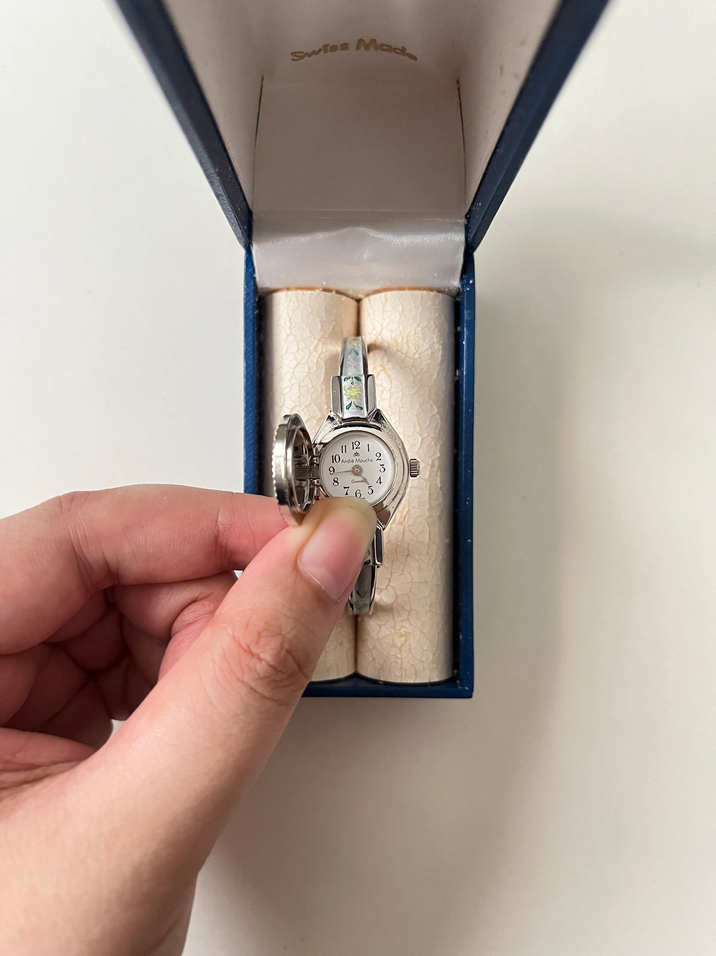 Beautiful Silver Tone Open Cuff Peekaboo Swiss Watch with White Floral Enameled Bracelet