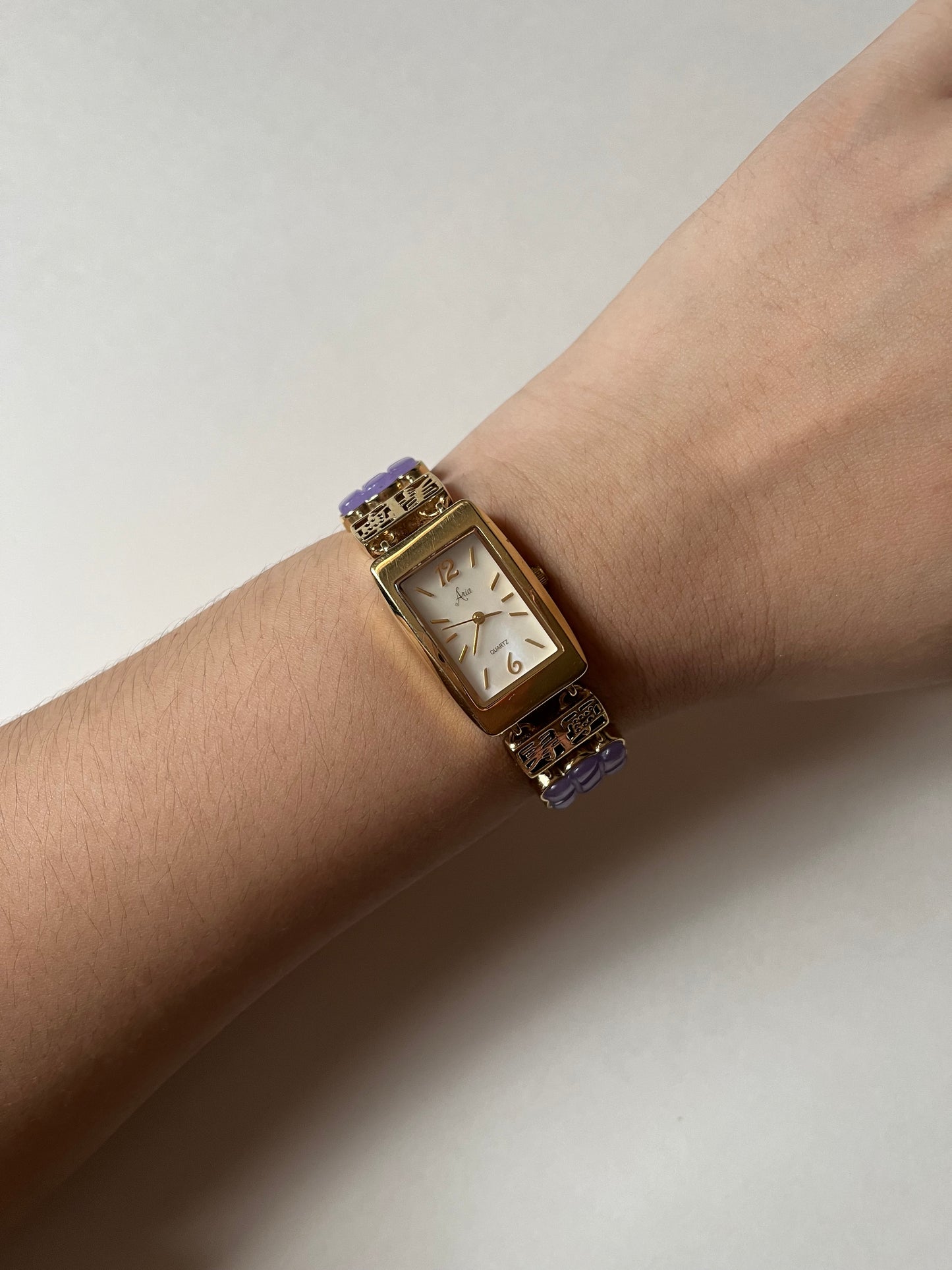 Astonishing Gold Tone Watch with Purple Jades Inlaid Band