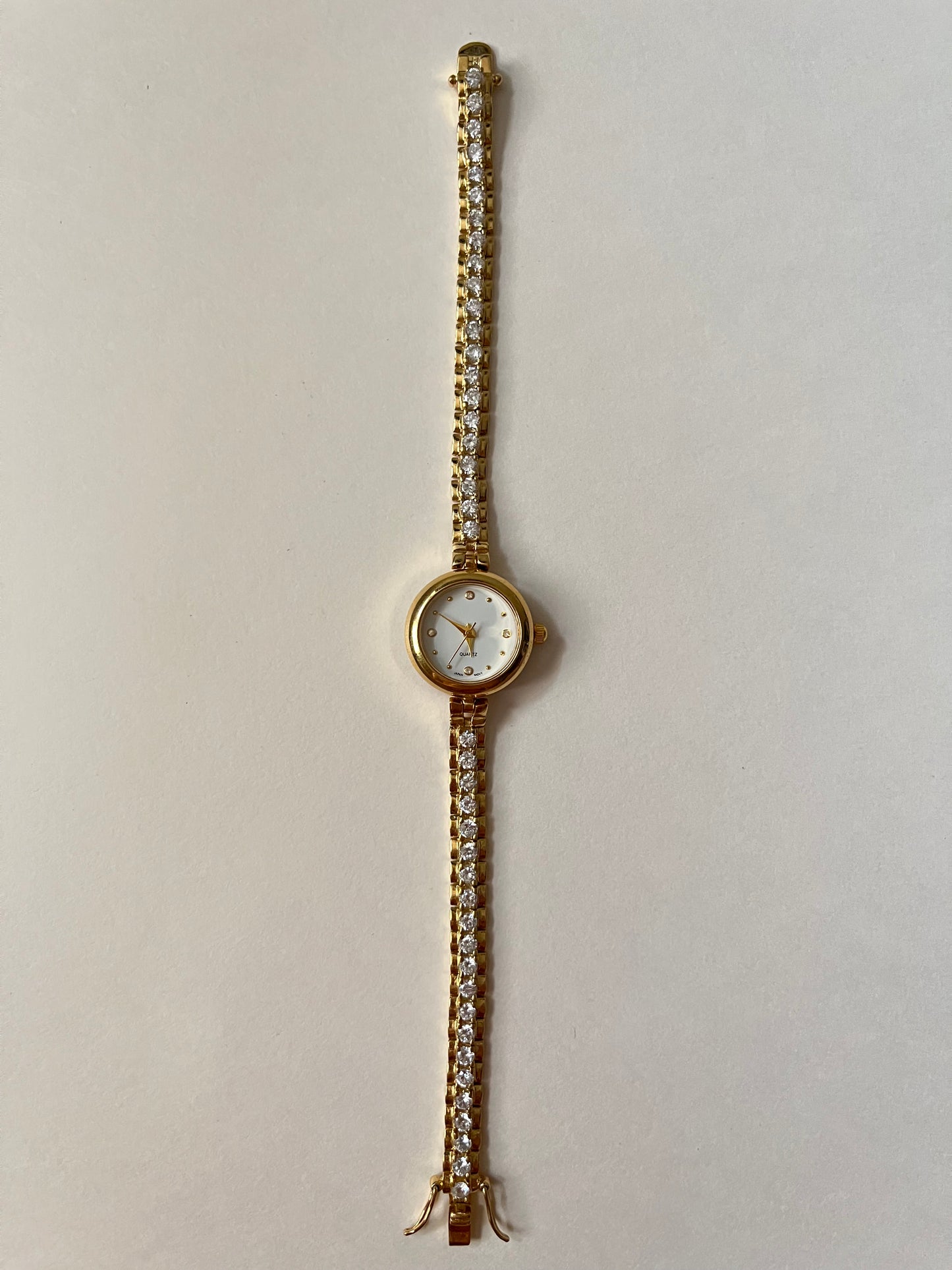 Gorgeous Tennis Bracelet Style Gold Tone Watch with Round Dial