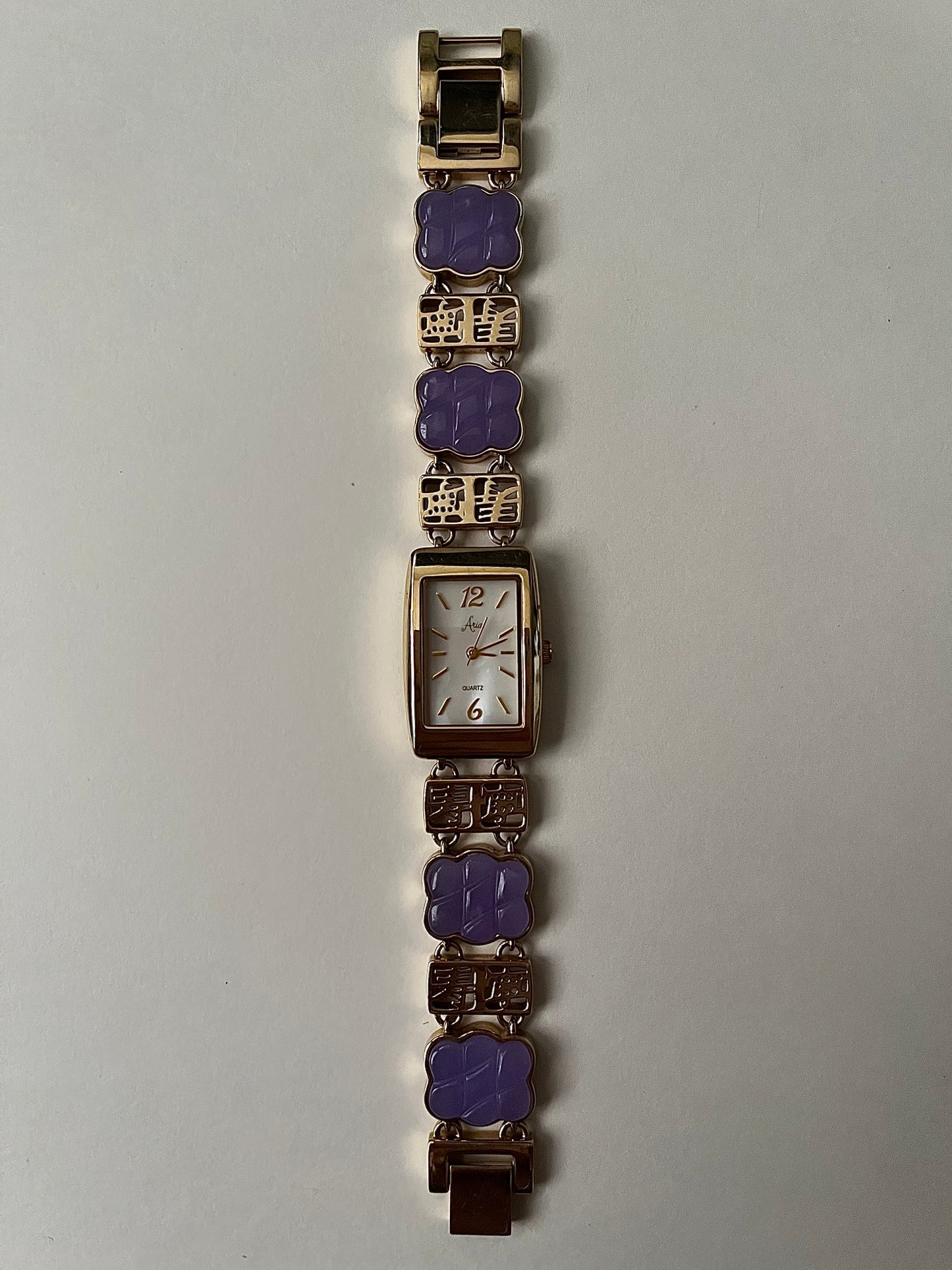 Astonishing Gold Tone Watch with Purple Jades Inlaid Band