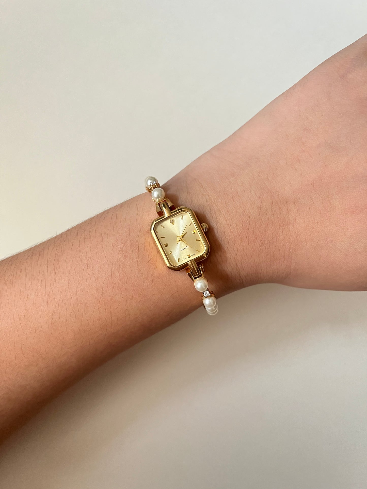 Stunning Gold Tone Watch with Rectangular Dial and Faux Pearls Accent