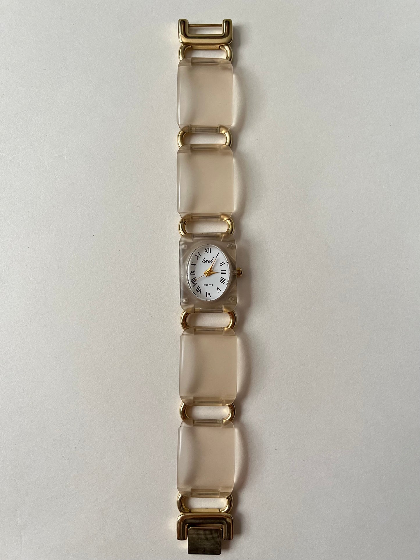 Adorable Gold Tone Acrylic Watch with Oval Dial