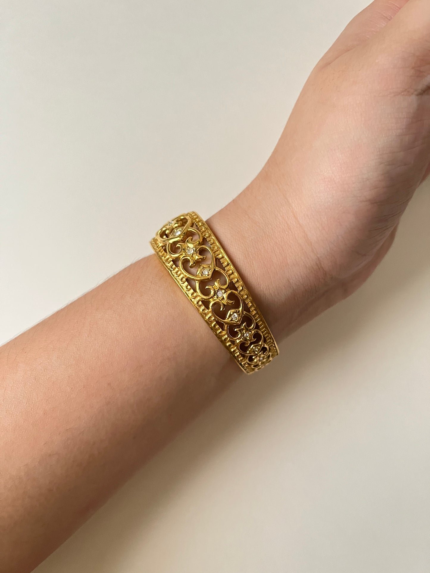 Very Gorgeous and Ornate Gold Tone Peekaboo Cuff Watch with Oval Dial