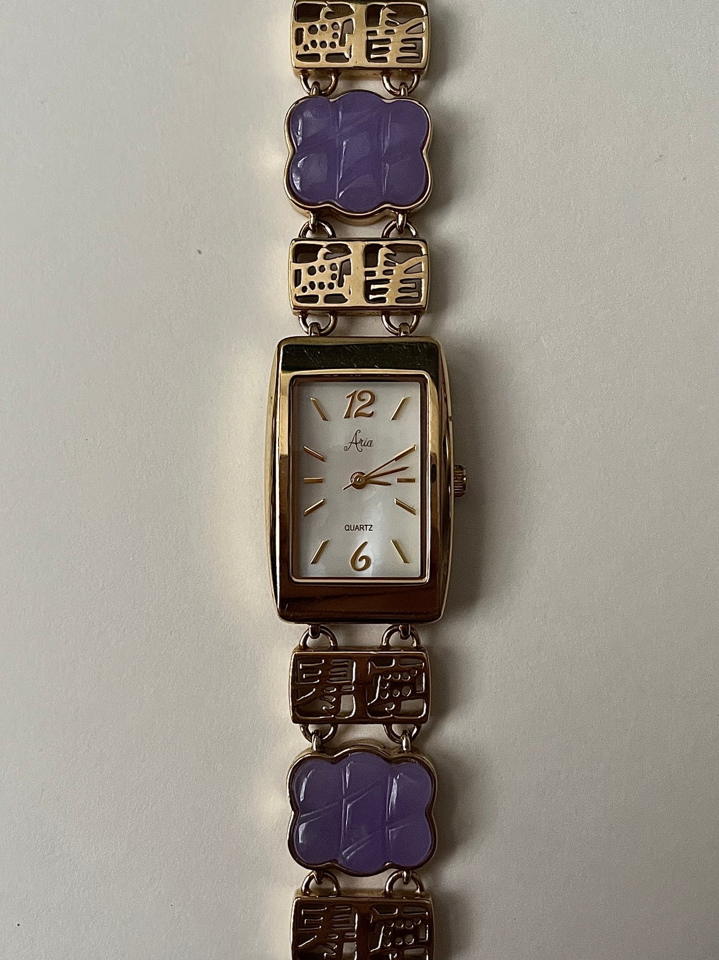 Astonishing Gold Tone Watch with Purple Jades Inlaid Band