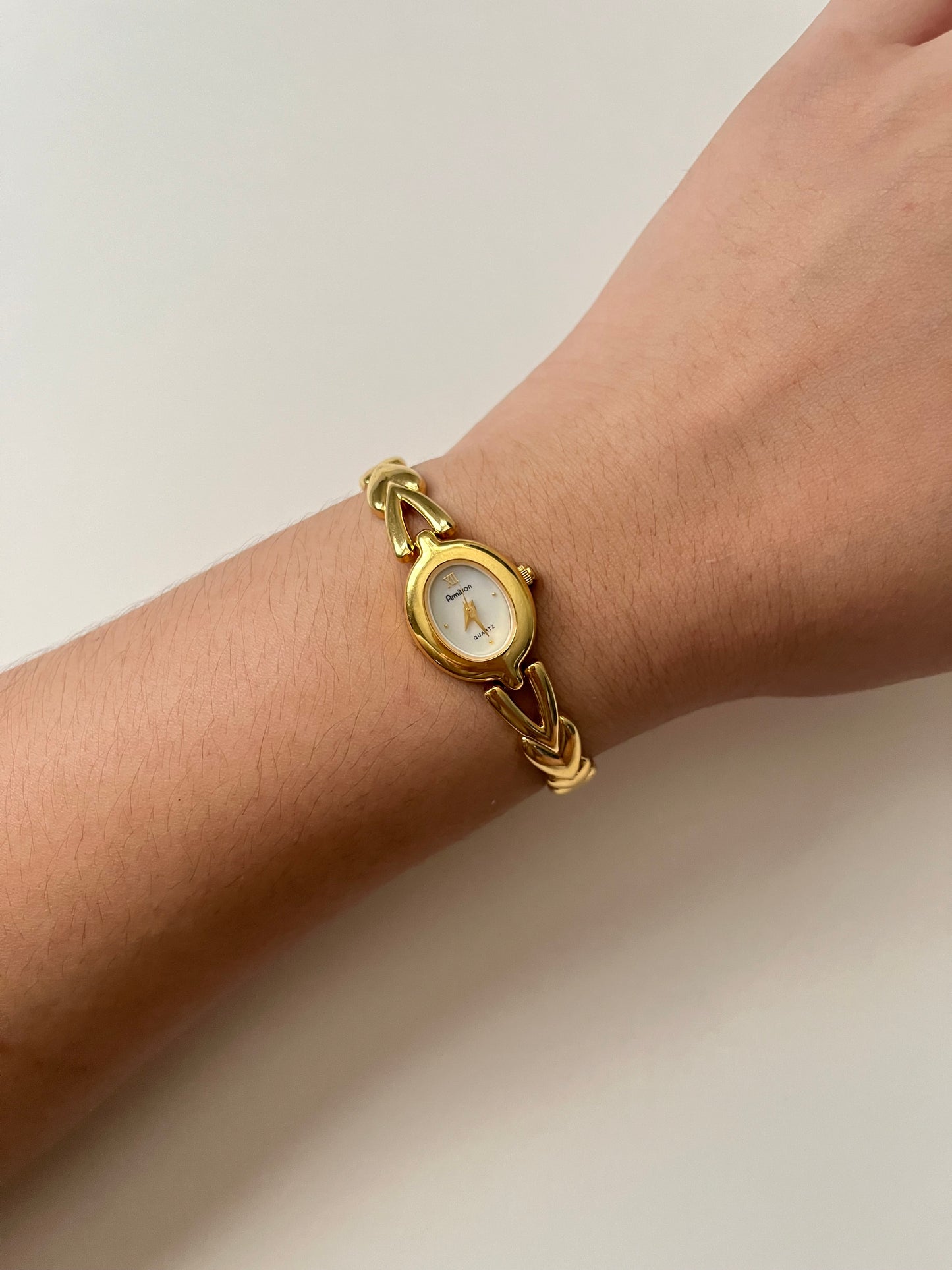 Absolutely Stunning Gold Tone Half Cuff Watch with Oval Dial