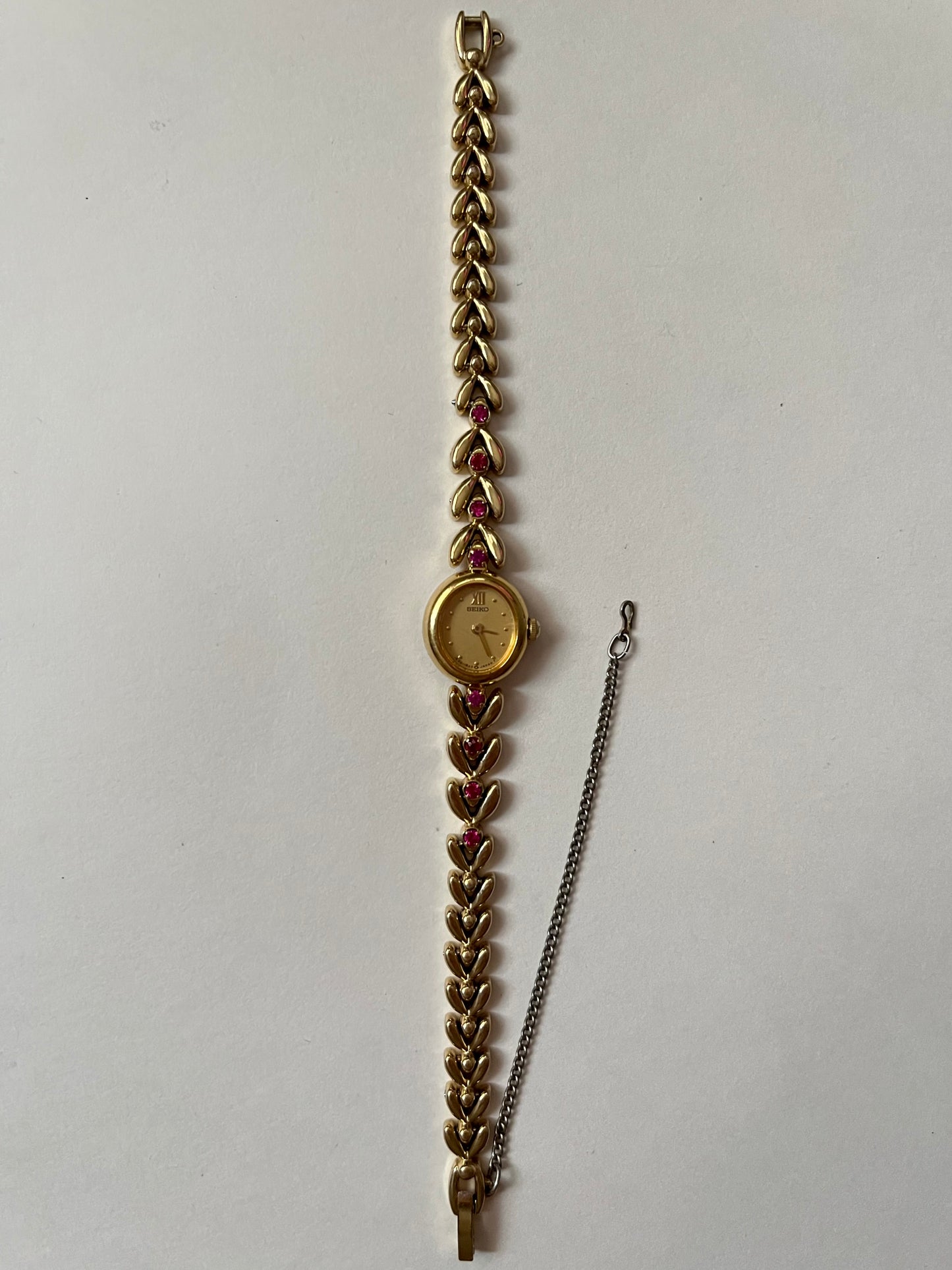 Absolutely Gorgeous and Extremely Rare Gold Tone Seiko Watch with Rubies Accent