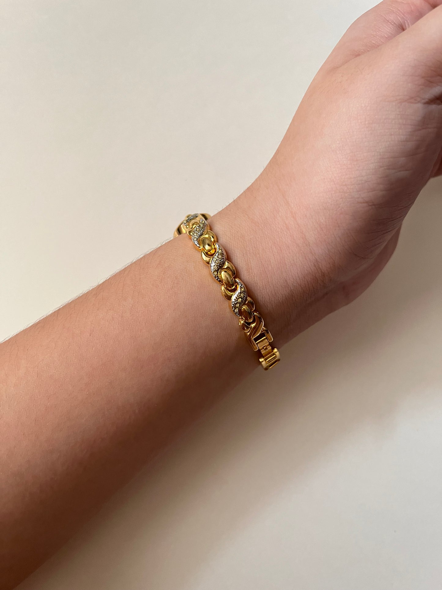 Dainty Gold Tone Watch with Oval Dial and Rhinestones Accent