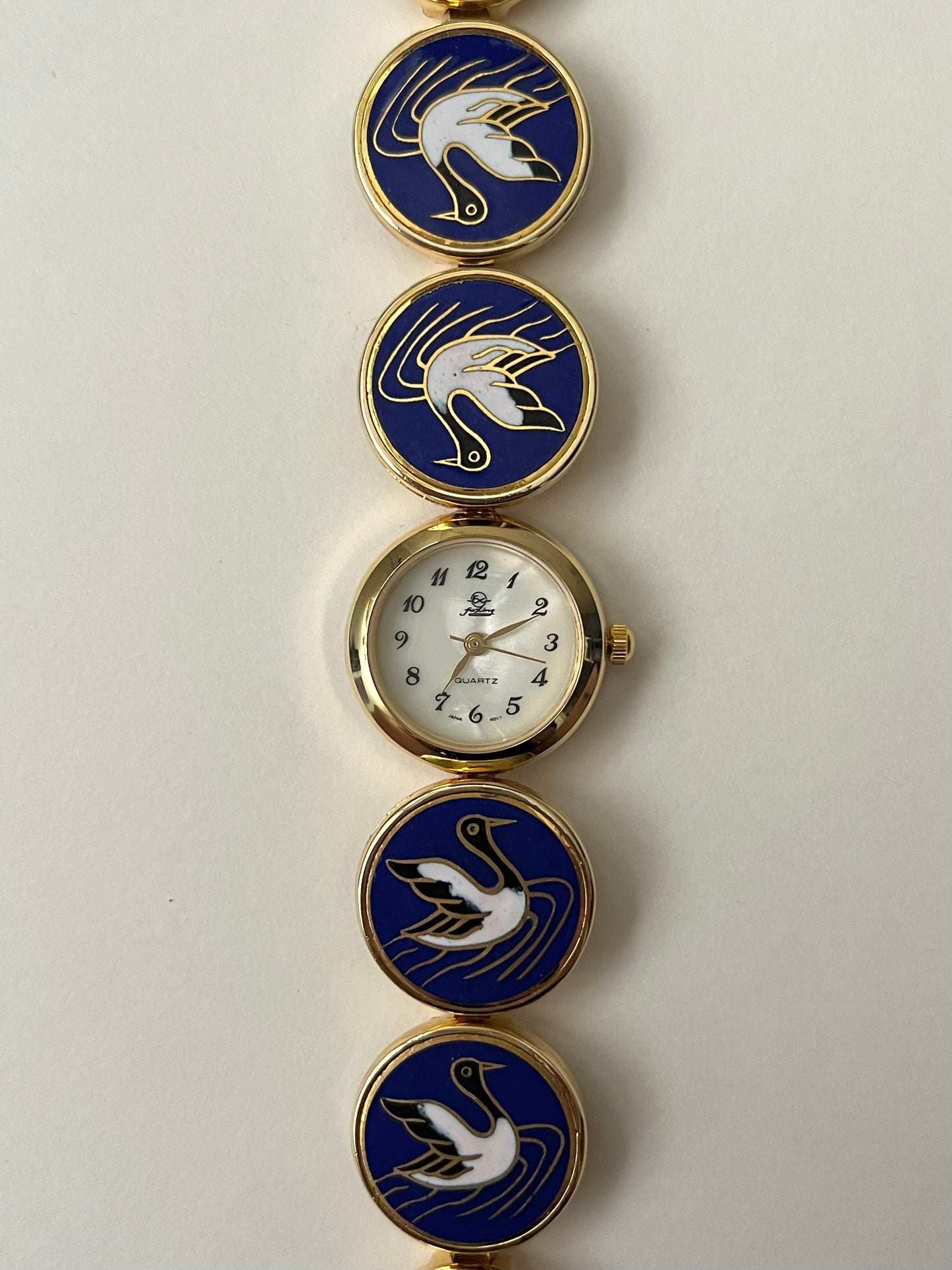 Beautiful Gold Tone Watch with Oriental Crane Designed Band