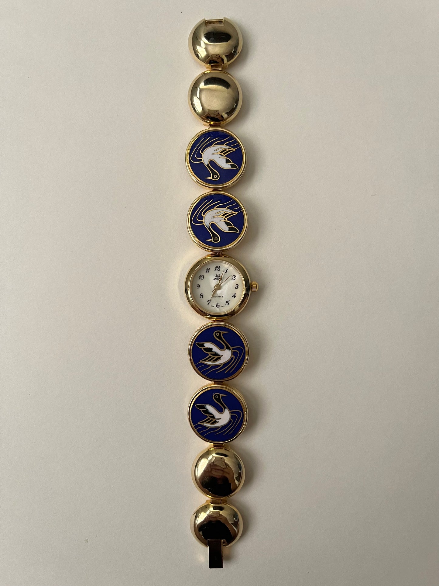 Beautiful Gold Tone Watch with Oriental Crane Designed Band