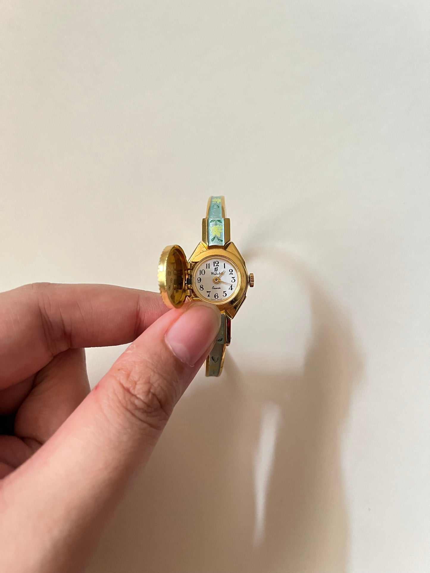 Beautiful Silver Tone Open Cuff Peekaboo Swiss Watch with Floral Green Enameled Bracelet