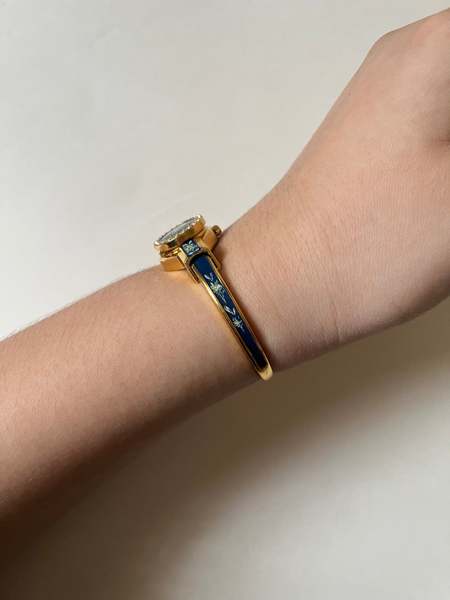 Beautiful Gold Tone Open Cuff Peekaboo Swiss Watch with Navy Floral Enameled Bracelet