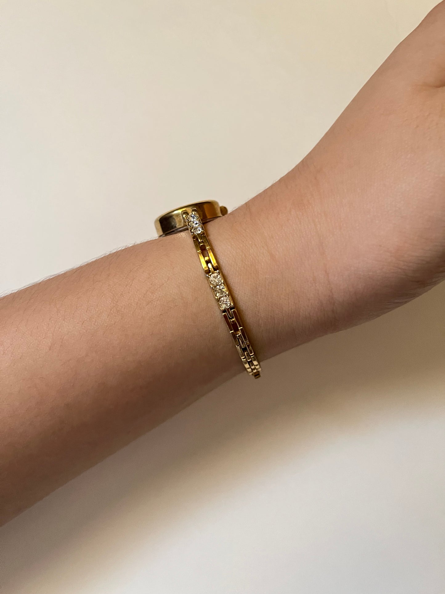 Dainty Gold Tone Watch with Round Dial and Rhinestones Accent