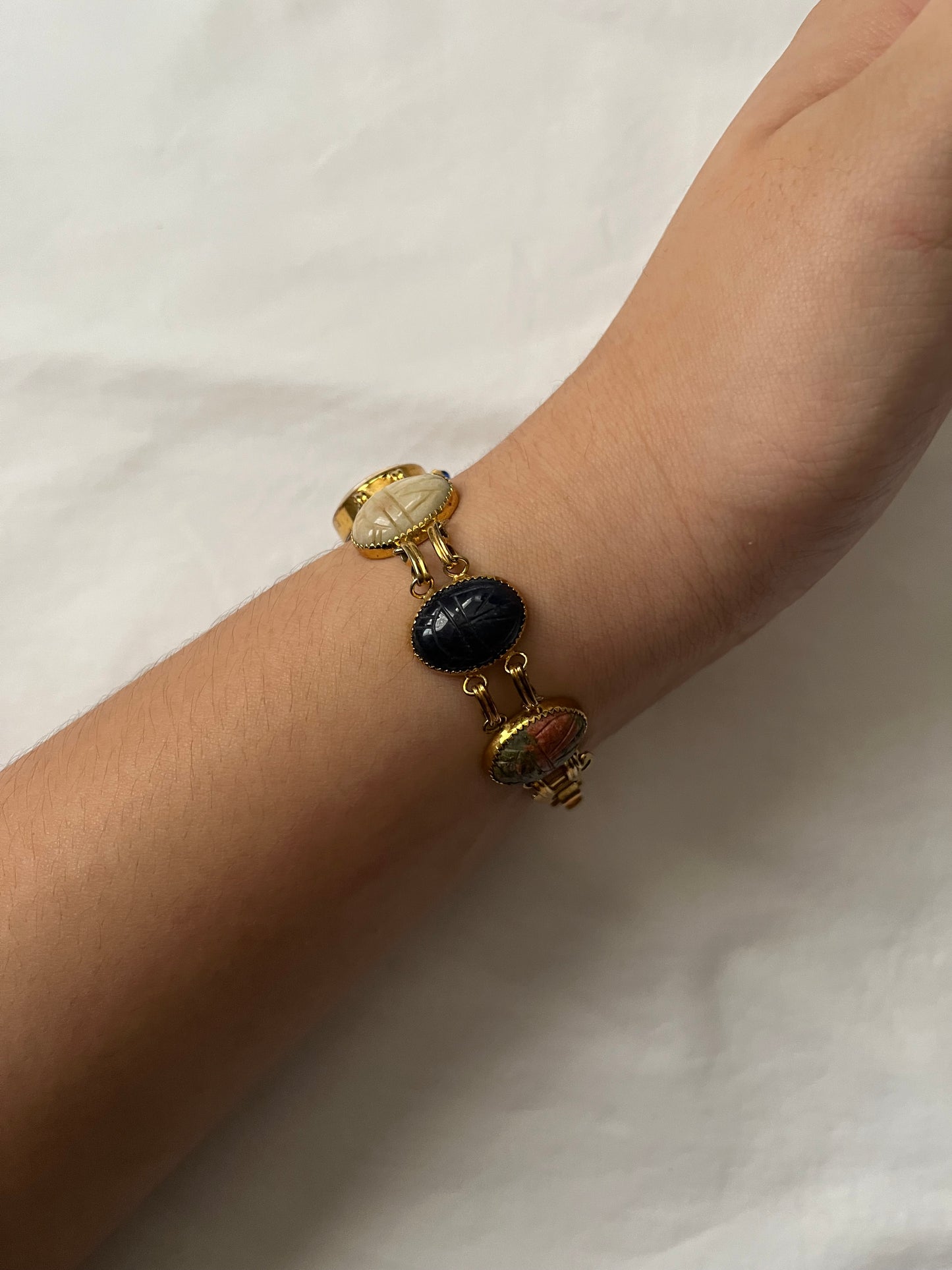 Rare Vintage Gold Tone Watch with Scarab Carved Multi-Stones Band