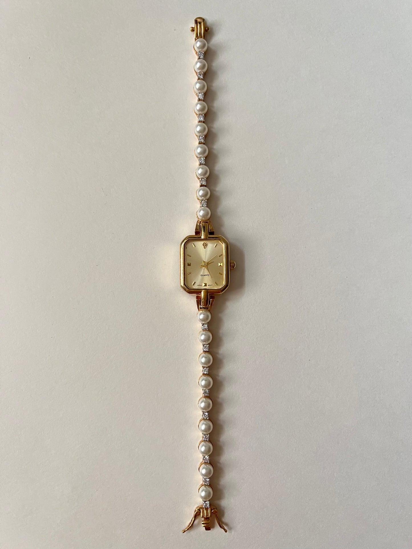 Stunning Gold Tone Watch with Rectangular Dial and Faux Pearls Accent