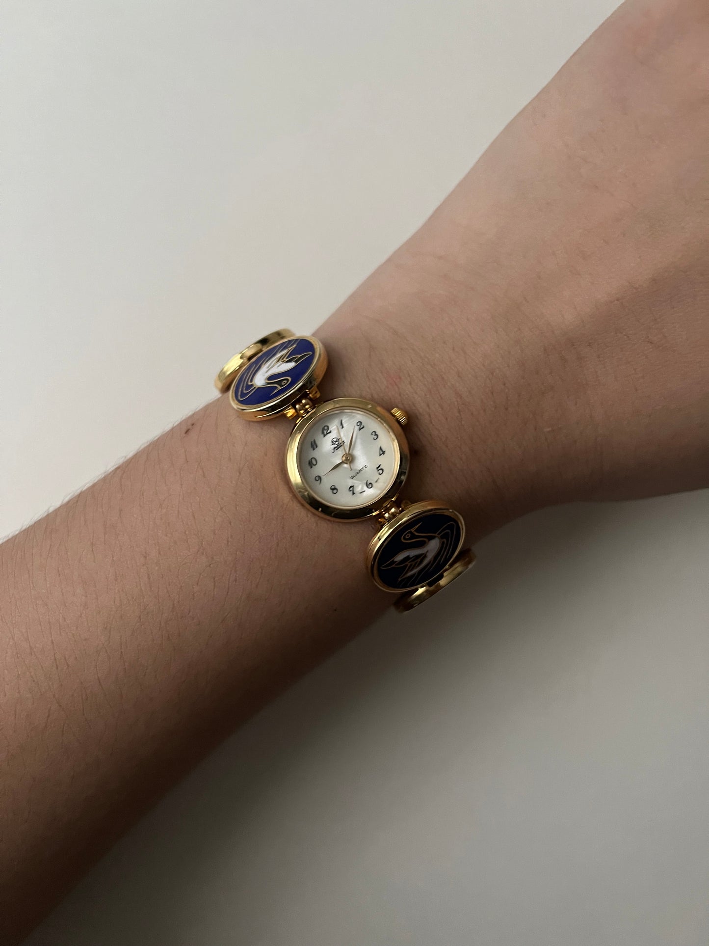 Beautiful Gold Tone Watch with Oriental Crane Designed Band
