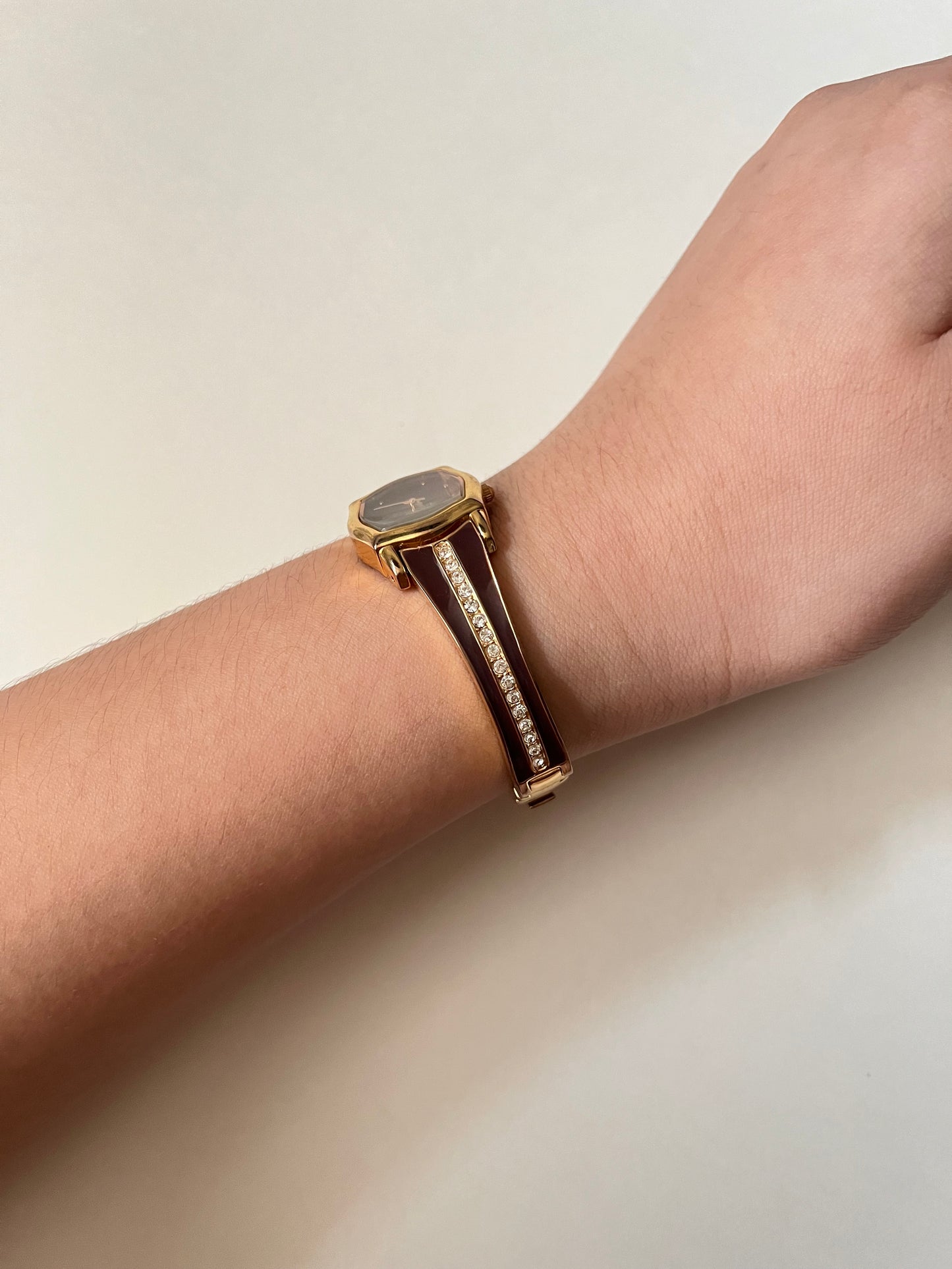 Gold Tone Half Cuff Watch with Rich Bordeaux Dial and Enameled Bracelet
