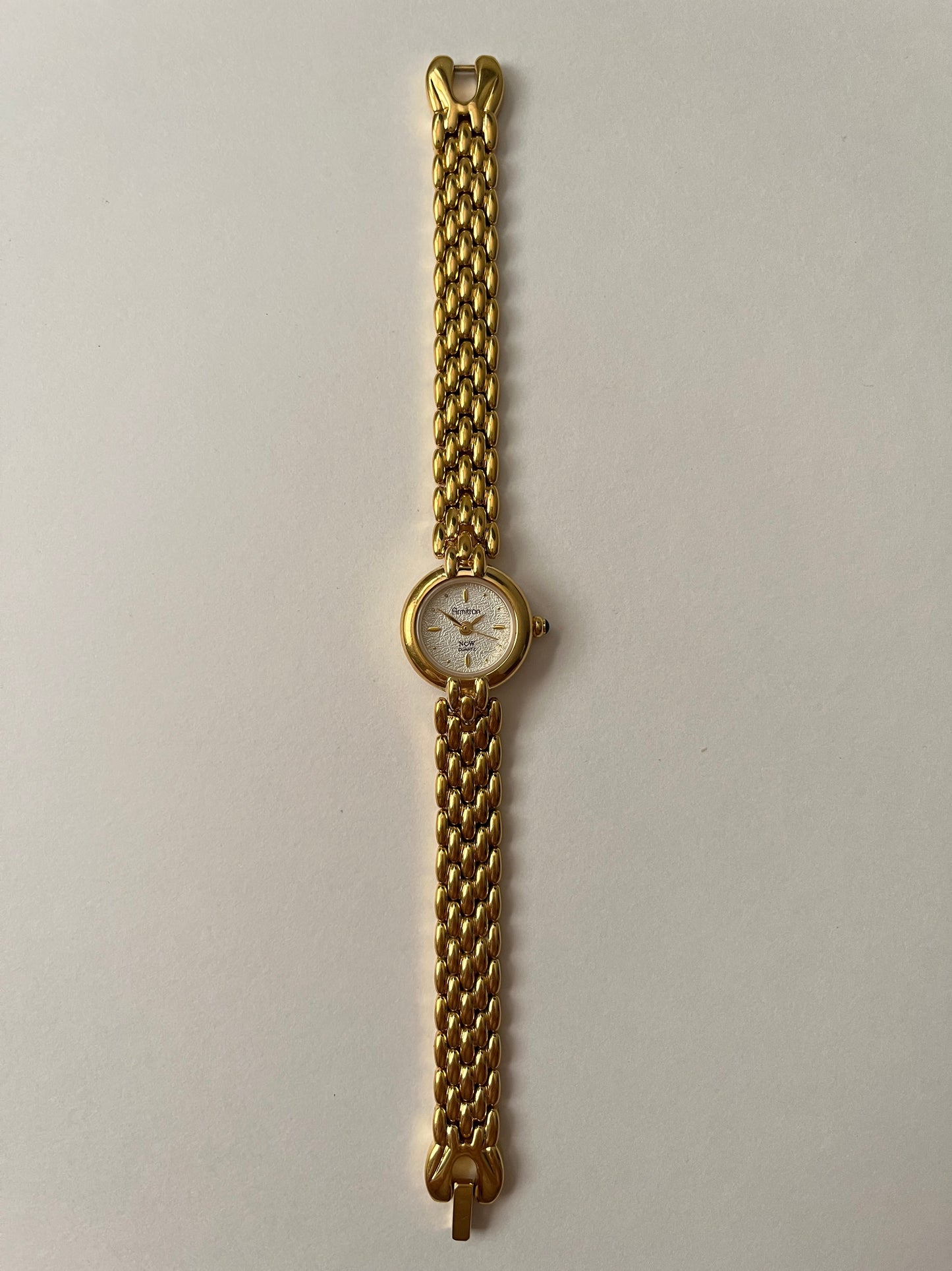 Beautiful Gold Tone Watch with Dainty Round Textured Dial