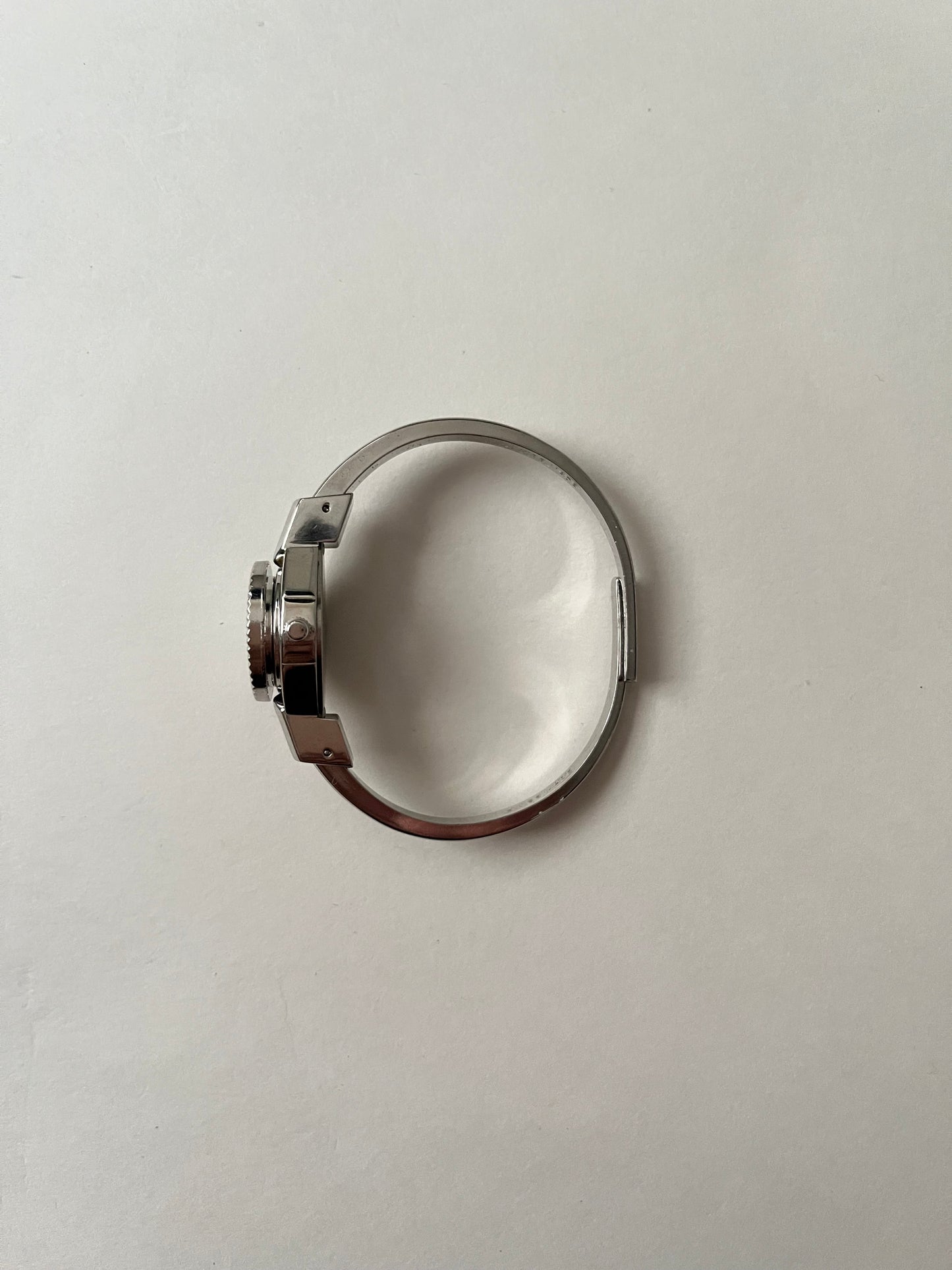 Beautiful Silver Tone Open Cuff Peekaboo Swiss Watch with White Floral Enameled Bracelet