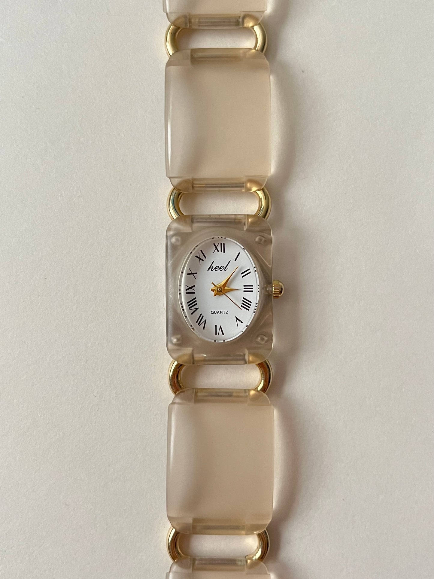 Adorable Gold Tone Acrylic Watch with Oval Dial