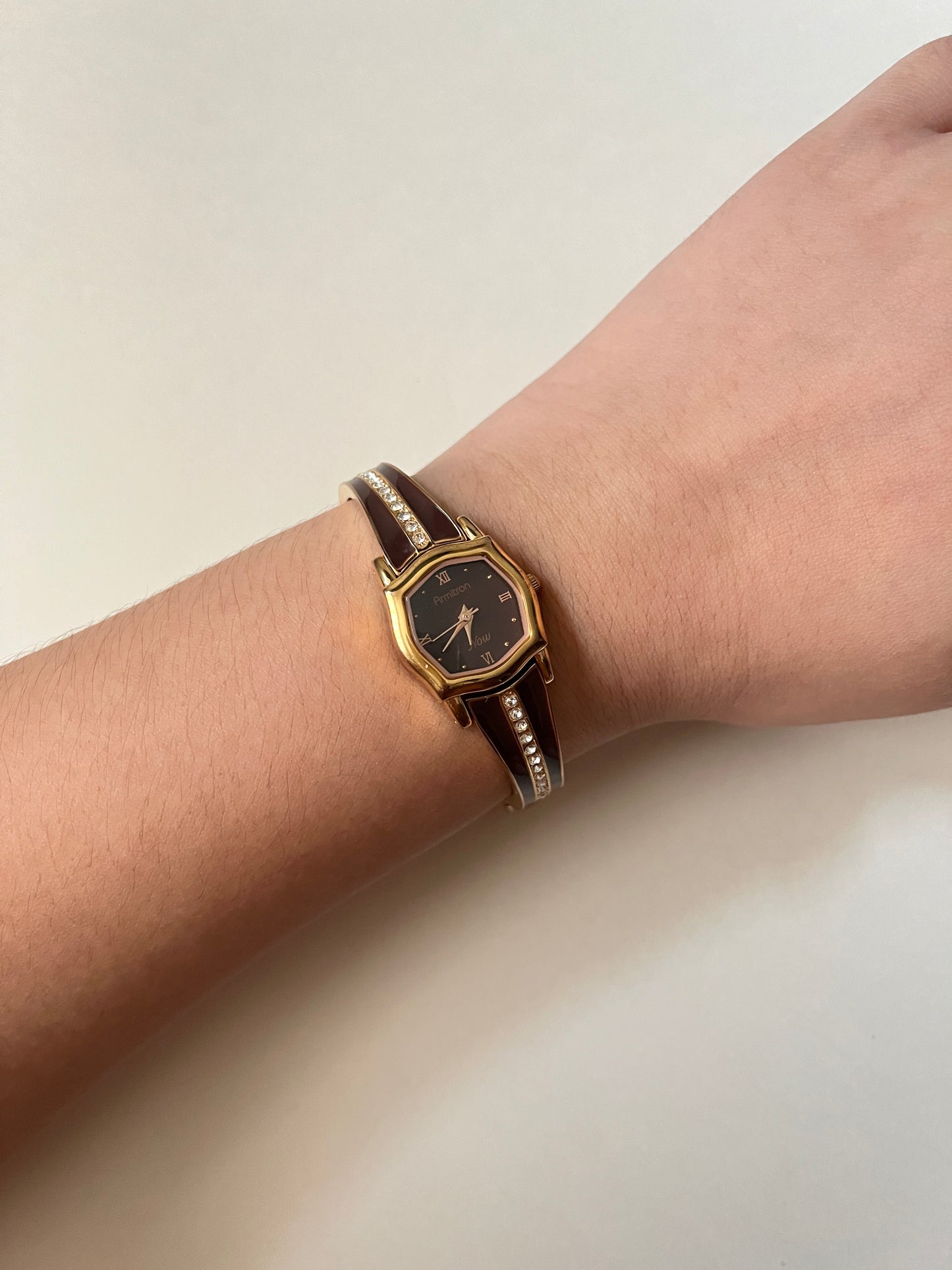 Gold Tone Half Cuff Watch with Rich Bordeaux Dial and Enameled Bracelet