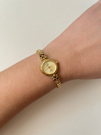 Adorable Dainty Gold Tone Swiss Watch with Heart-Shaped Links And Red Stones Accents
