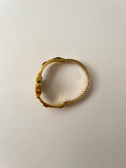 Gorgeous Gold Tone Expansion Watch with Red Gems Accent