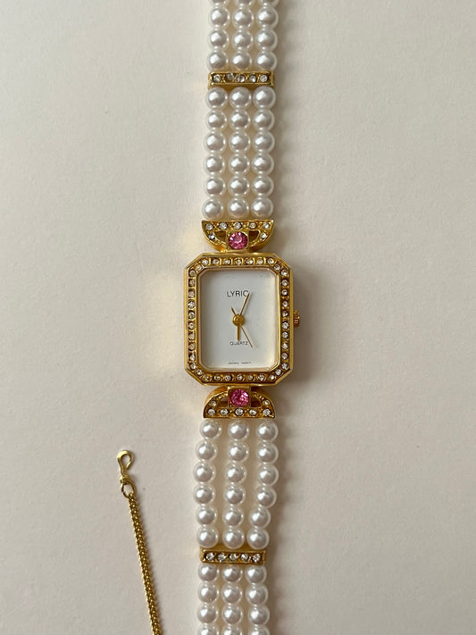 Gorgeous Faux Pearl Gold Tone Watch with Rectangular Dial and White and Pink Stones Accent