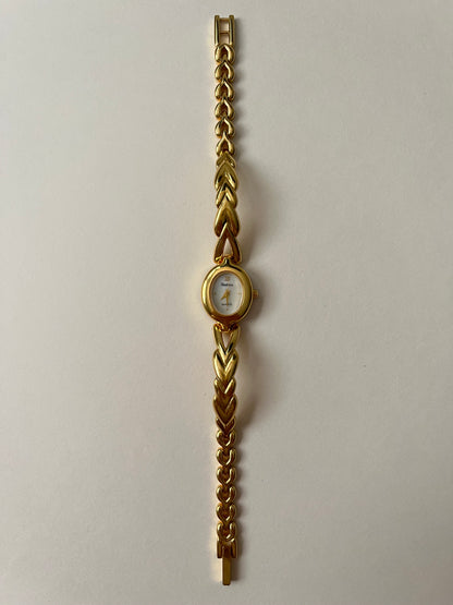 Absolutely Stunning Gold Tone Half Cuff Watch with Oval Dial