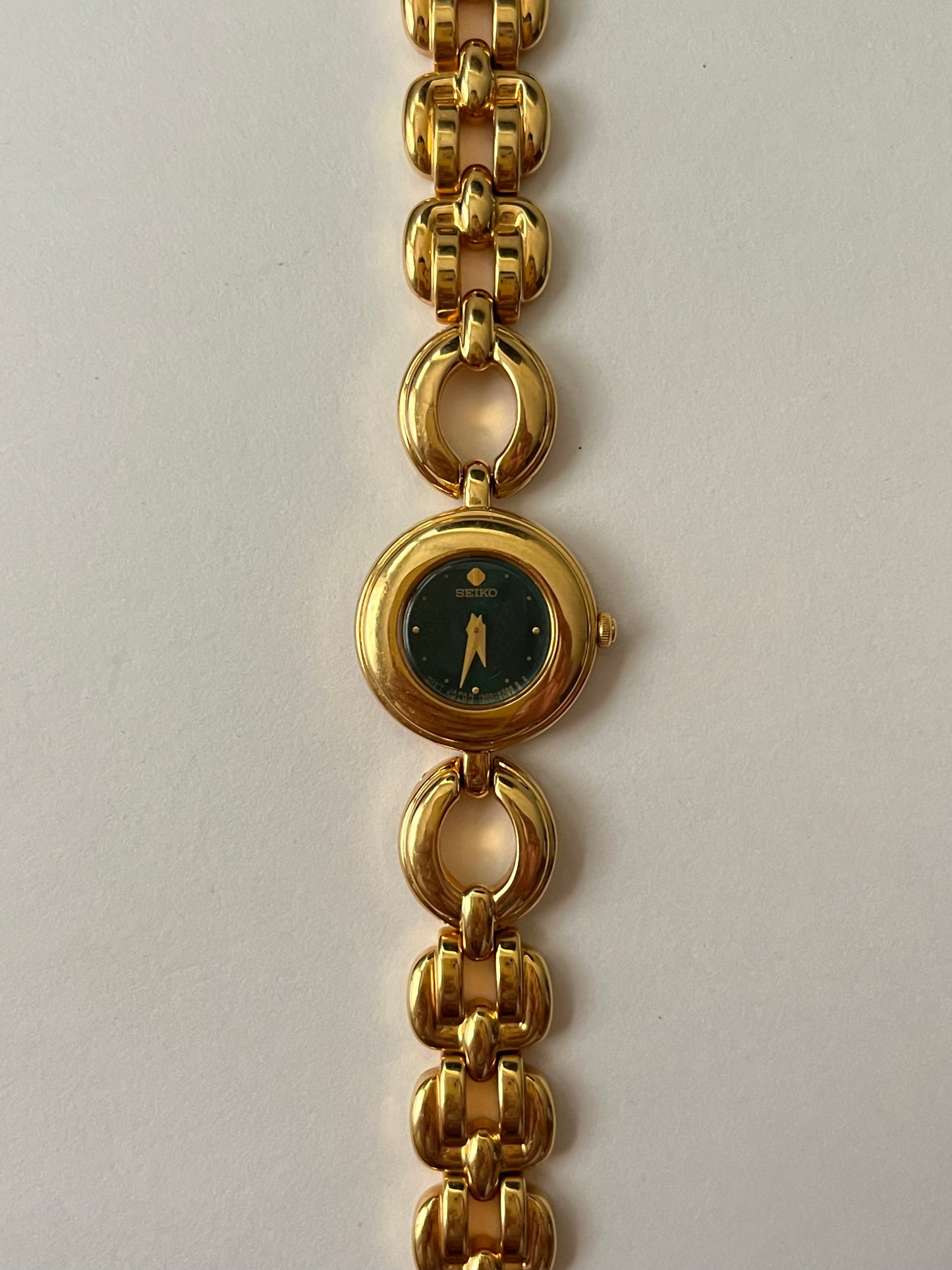 Extremely Rare and Beautiful Vintage Gold Tone Seiko Watch with Round Emerald Green Dial