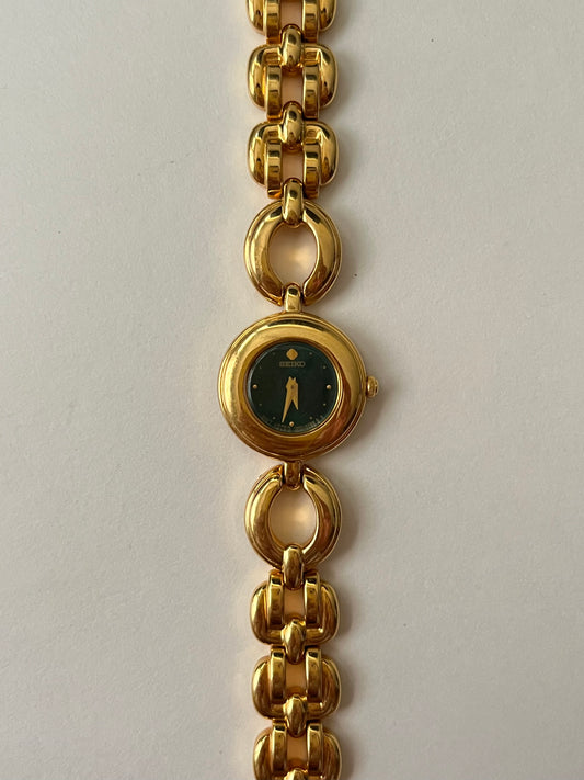 Extremely Rare and Beautiful Vintage Gold Tone Seiko Watch with Round Emerald Green Dial