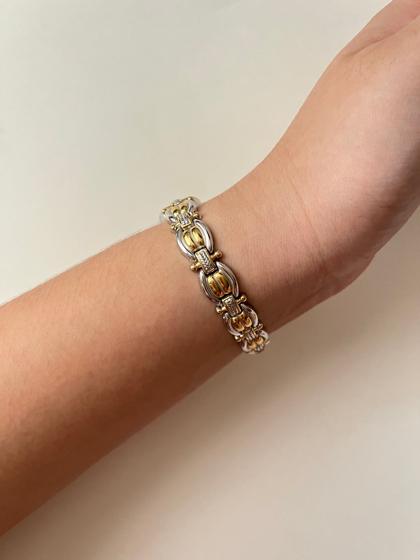 Lovely Two Toned Croton Watch with Intricate Band Design