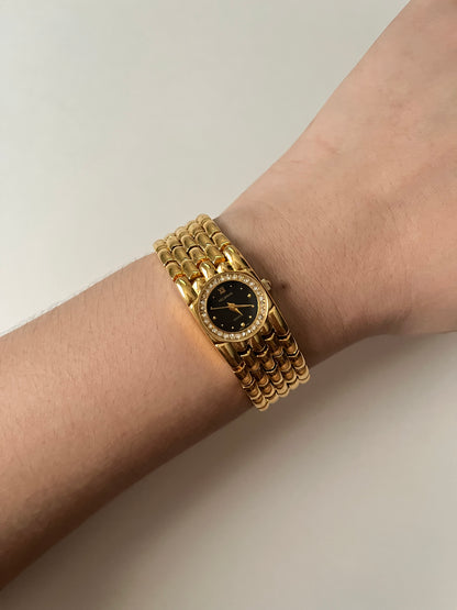 Very Chic Gold Tone Watch with Black Round Dial and Rhinestones Accent