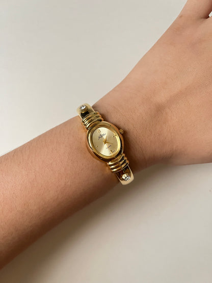 Extremely Rare Gold Tone Open Cuff Watch with Interchangeable Studs