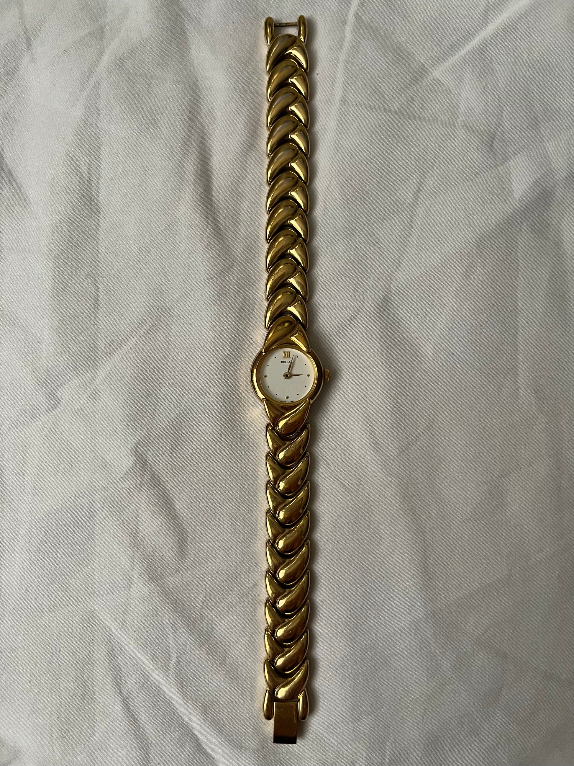 Beautiful Gold Tone Pulsar Watch with Braided Style Band
