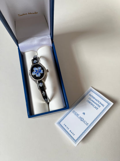 Beautiful Silver Tone Open Cuff Peekaboo Swiss Watch with Black Floral Enameled Bracelet