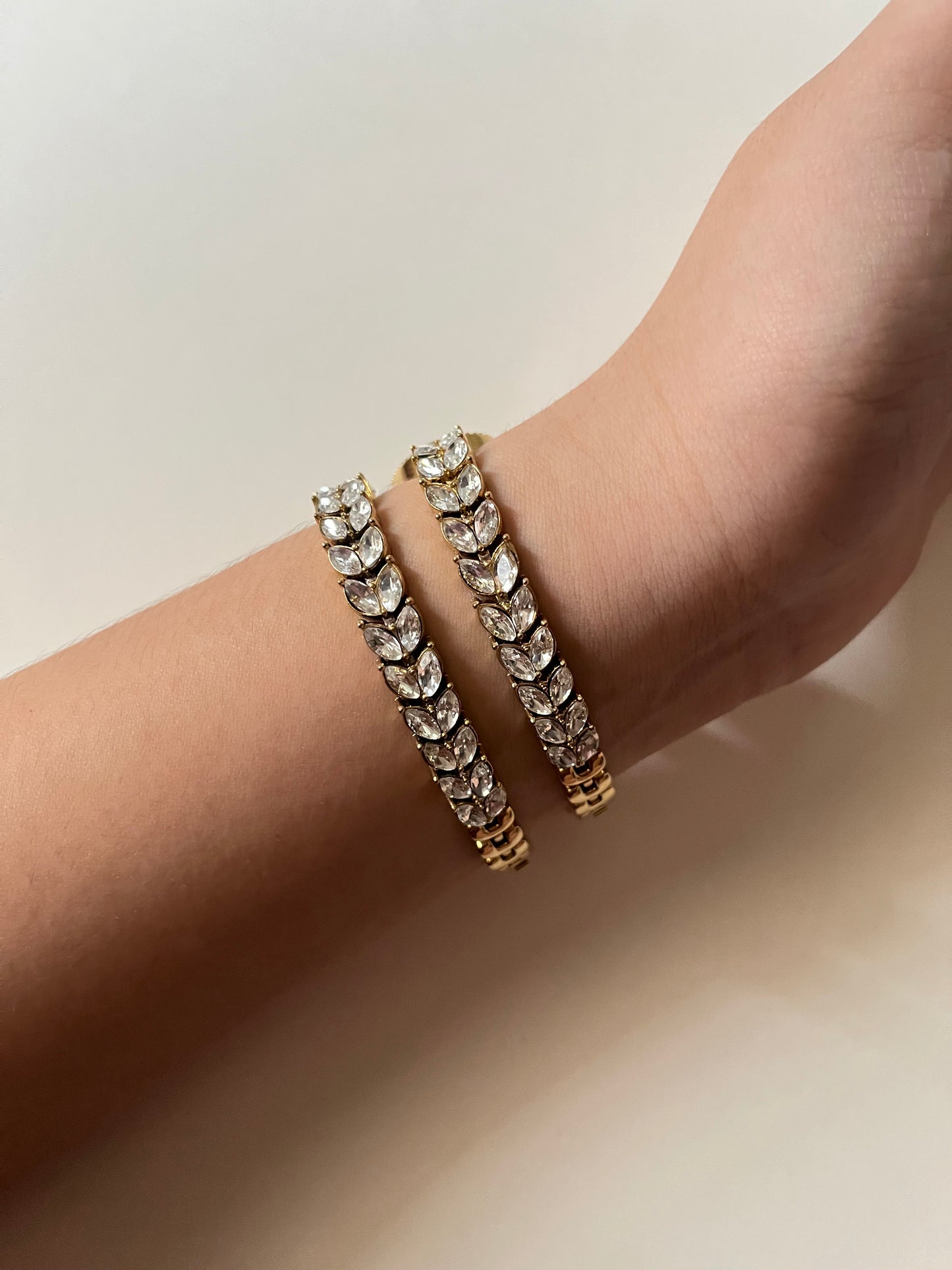Astonishing Gold Tone Watch and Bracelet Set with Marquise Cut Gem Encrusted Band
