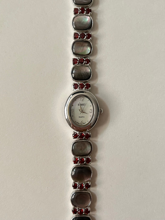 Captivating Silver Tone Watch with Red Stones and Gray Abalone Accents