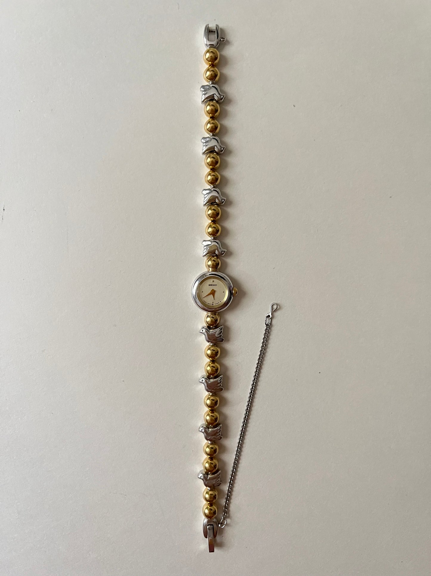 Extremely Rare and Dainty Two Toned Seiko Watch with Dove Bird Accents