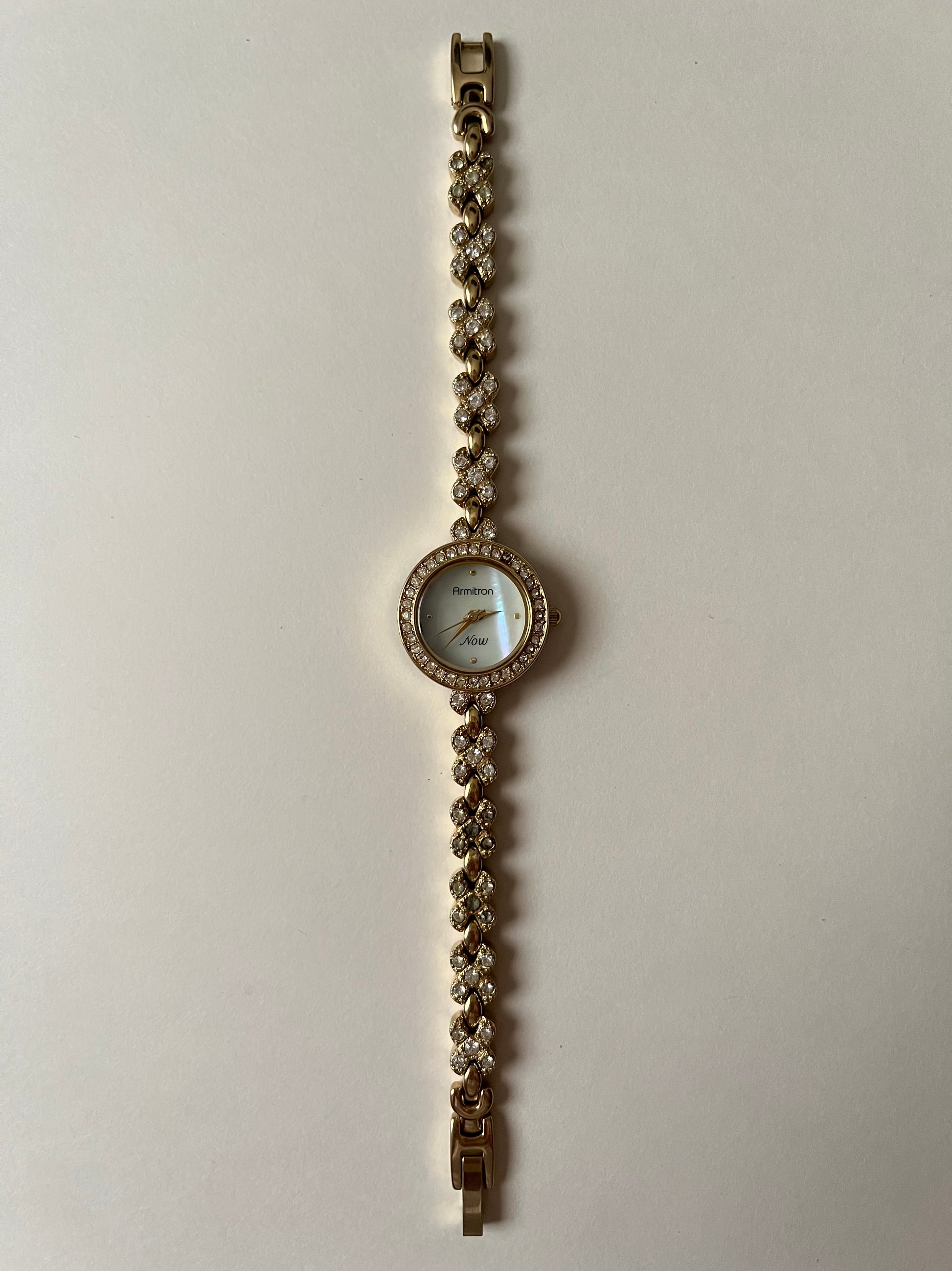 Lovely Gold Tone Armitron Now Watch with Rhinestones Encrusted Bezel and Bracelet