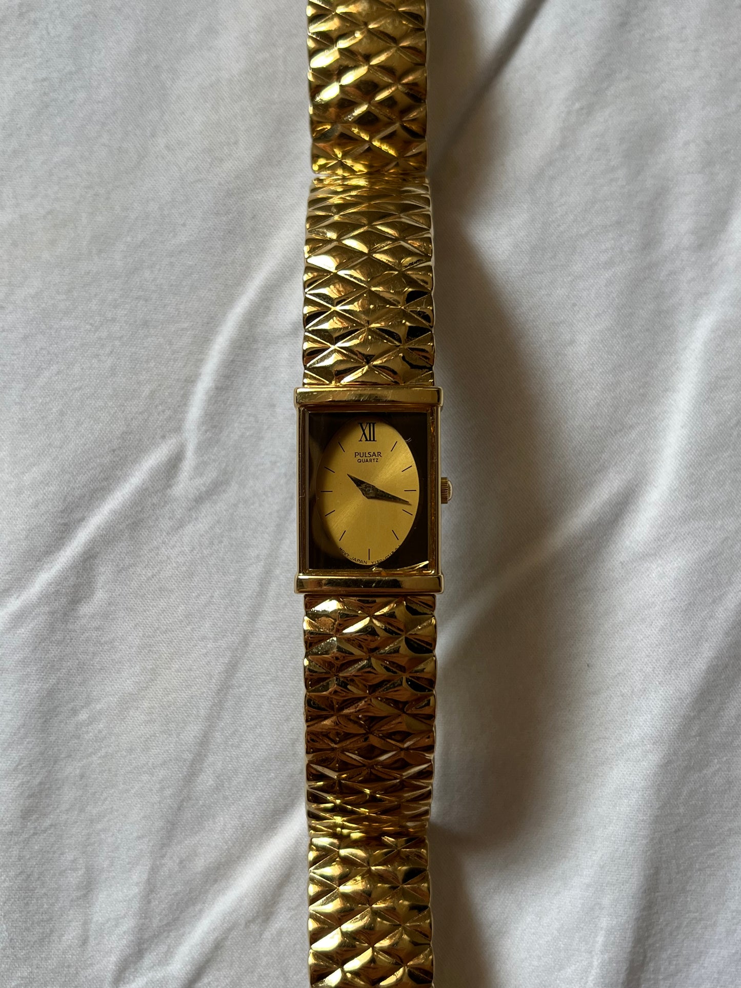 Very Stunning All Gold Tone Pulsar Watch with Oval Dial