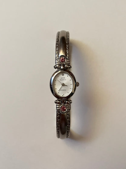 Silver Tone Anne Klein Cuff Watch with Oval Dial and Pink Stones Accent