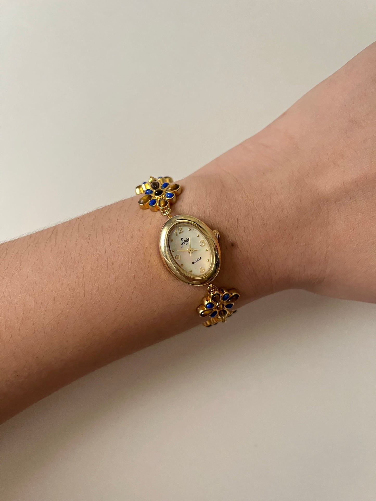 Adorable Gold Tone Watch with Lapis Lazuli and Tiger's Eye Stones Accent