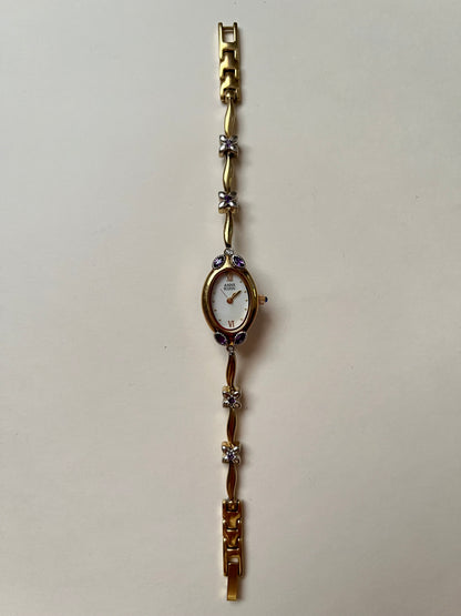 Gorgeous And Dainty Rare Gold Tone Anne Klein Watch with Purple Stones Accent