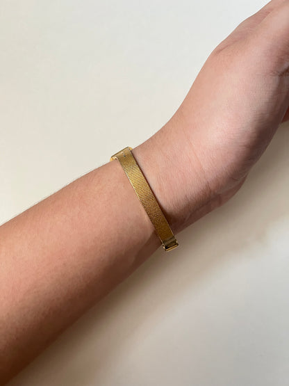 Elegant Vintage Gold Tone Watch with Rose Stem Accents