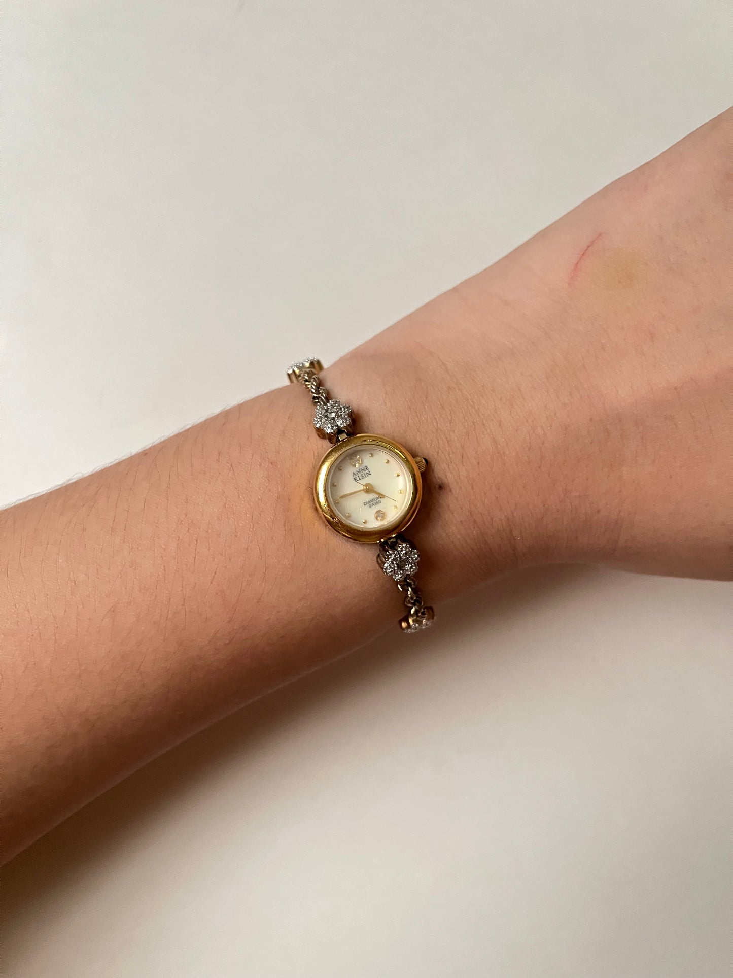 Very Dainty Gold Tone Anne Klein Swiss Watch with Real Diamond Flowers Accent