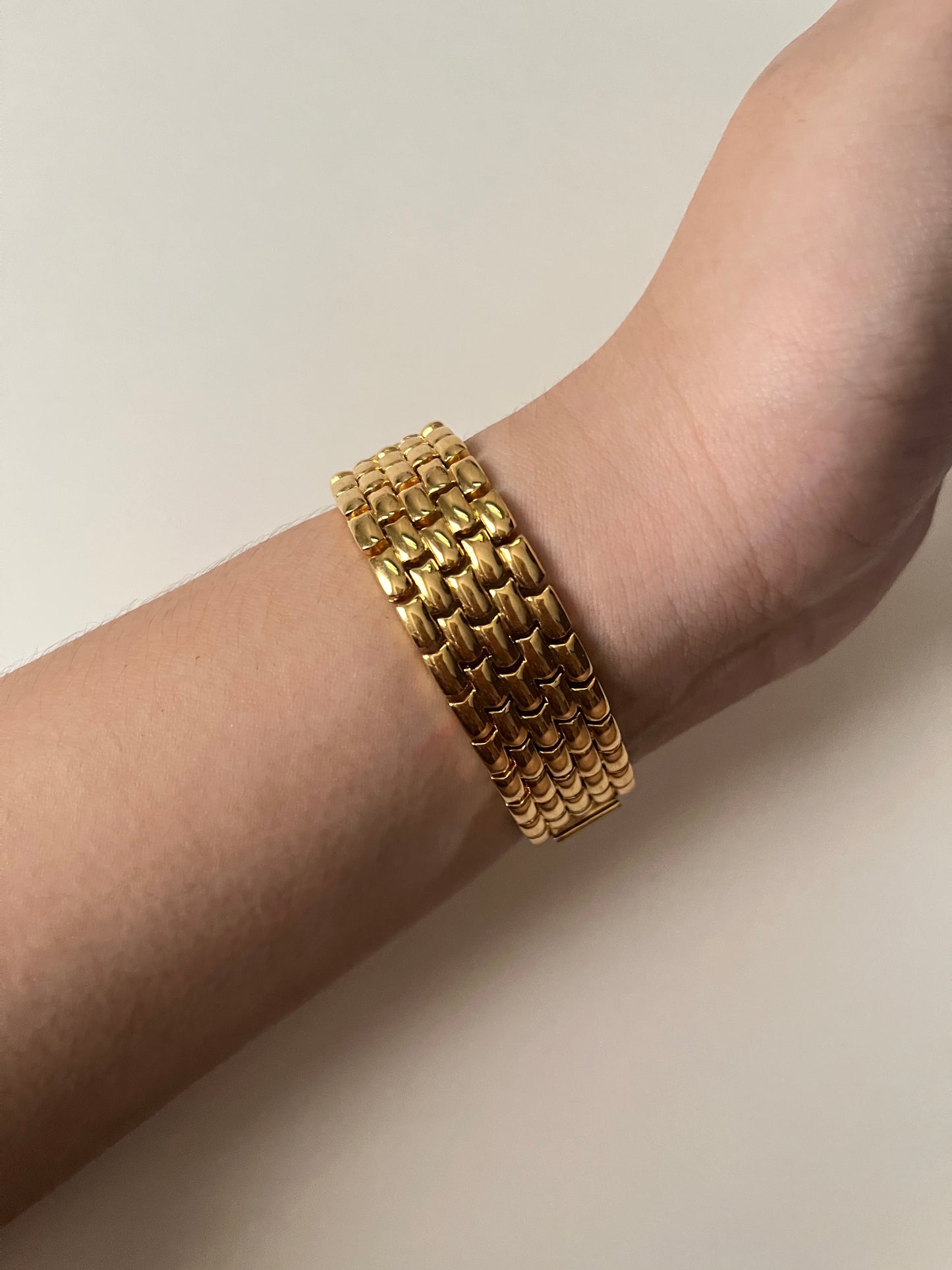 Very Chic Gold Tone Watch with Black Round Dial and Rhinestones Accent