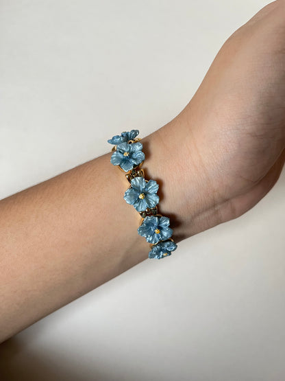 Adorable Gold Tone Watch with Round Dial and Blue Hibiscus Floral Links