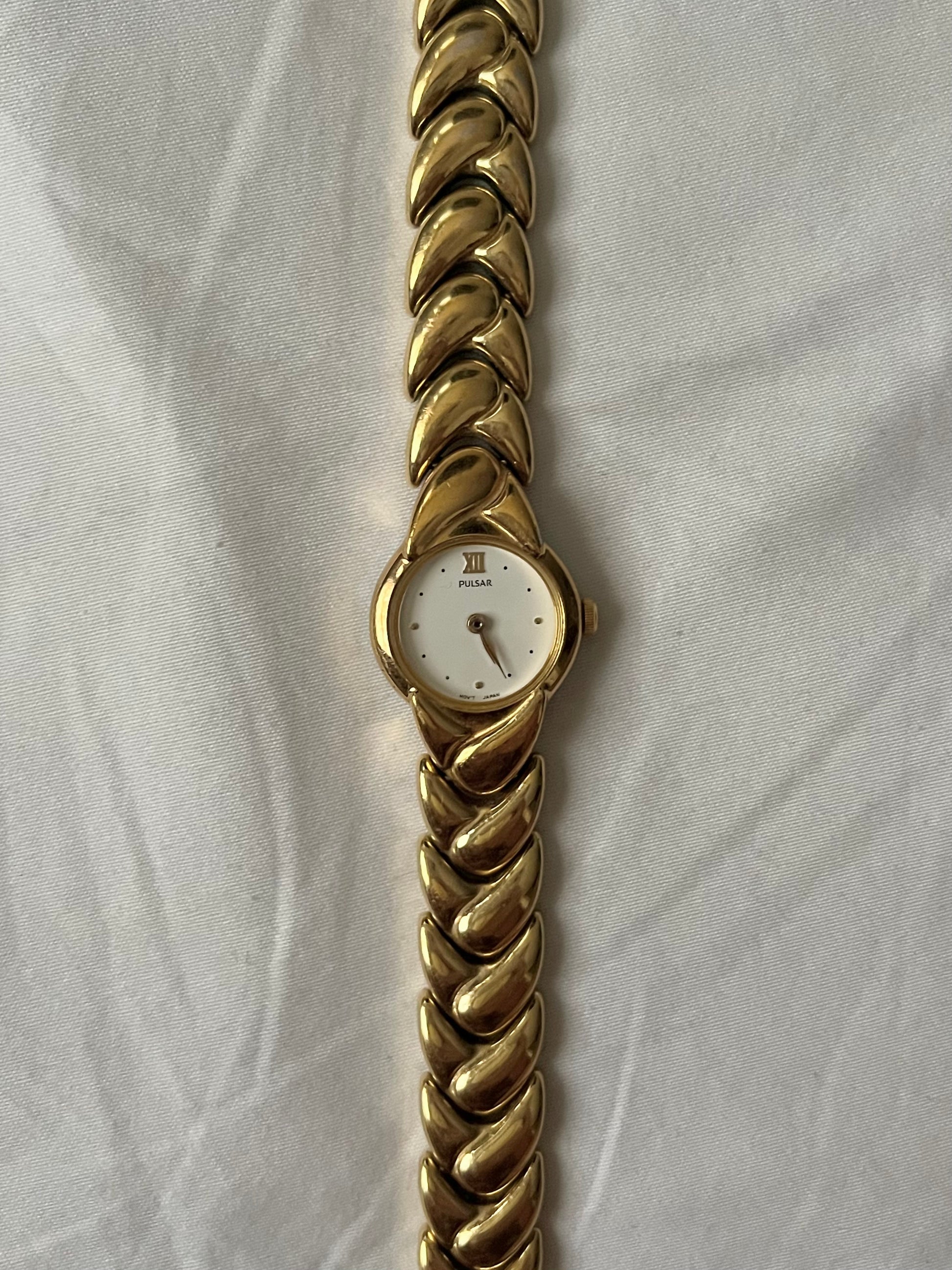 Beautiful Gold Tone Pulsar Watch with Braided Style Band